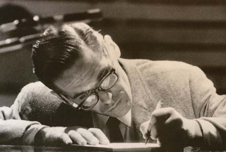 Bill Evans writing at the piano.