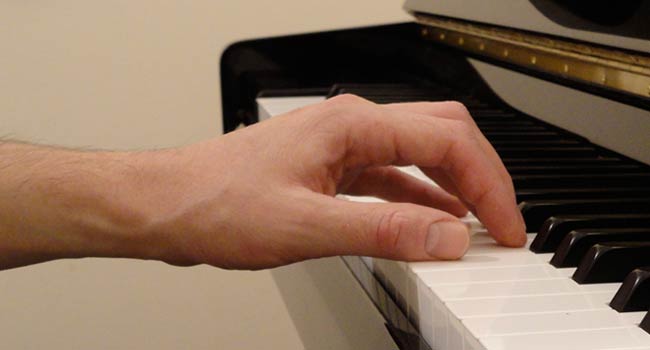 Proper position on piano bench